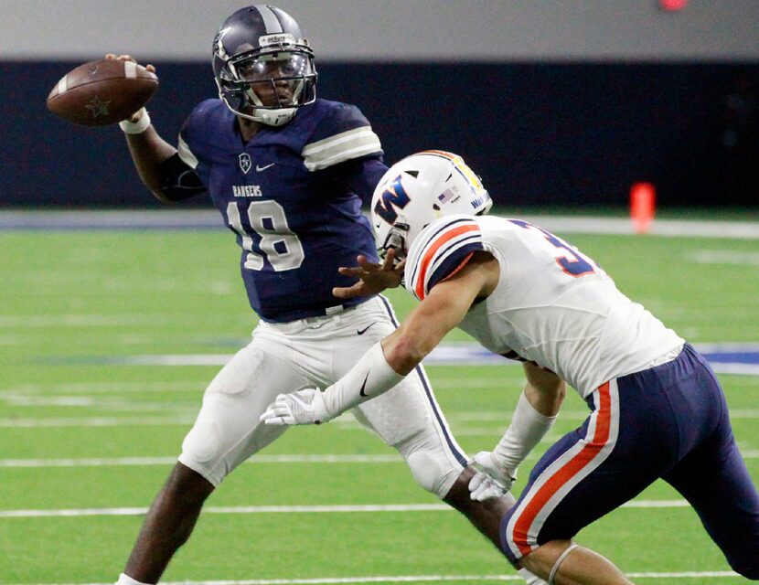 Lone Star High QB Jason Shelley (18) throws the ball under pressure from a Frisco Wakeland...