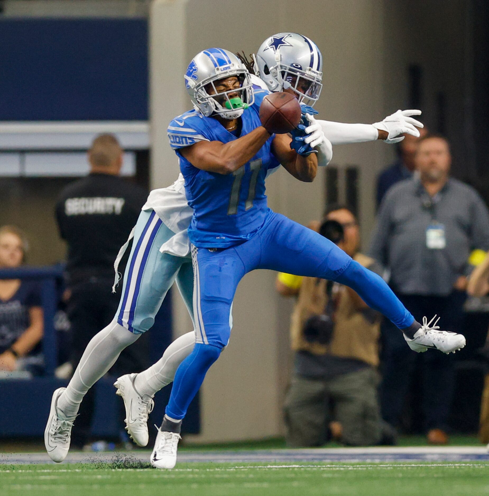 Dallas Cowboys cornerback Trevon Diggs (7) breaks up a pass intended for Detroit Lions wide...