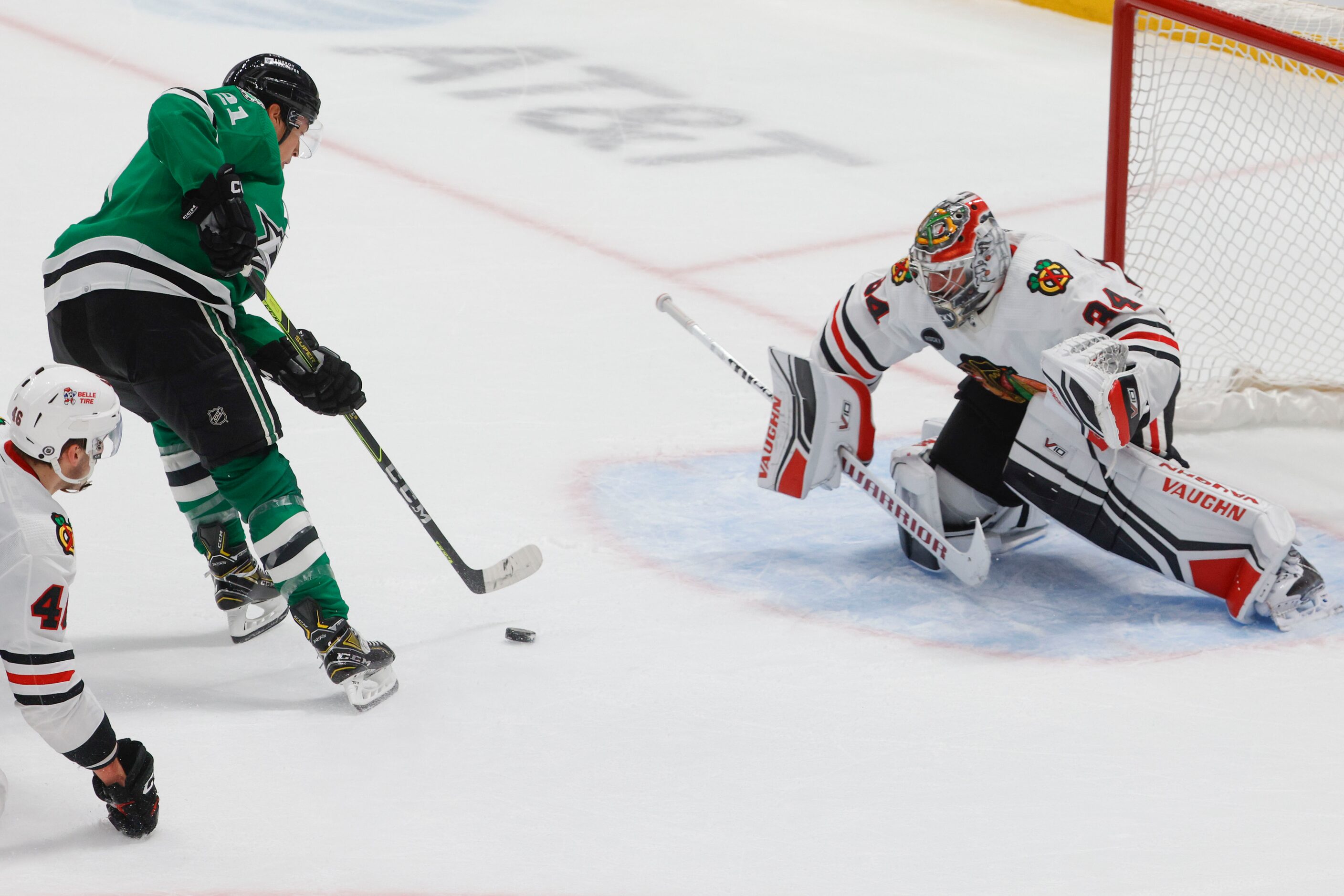 Dallas Stars left wing Jason Robertson (21) attacks against Chicago Blackhawks goaltender...