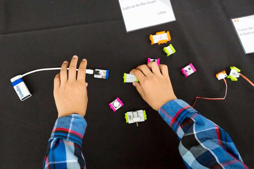 A youngster   learned  about electrical conductivity Saturday at the City of Learning...