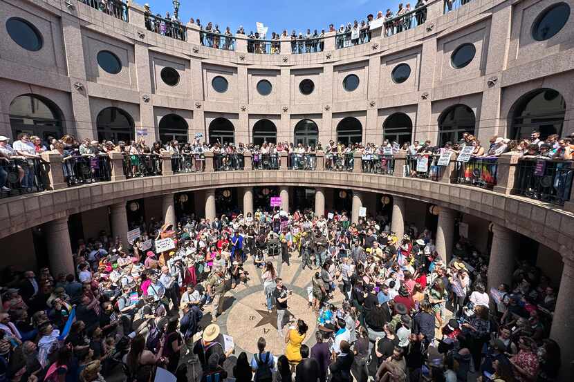 LGBTQ+ rights activists rally at the Texas Capitol in Austin, Texas on March 27, 2023.   We...