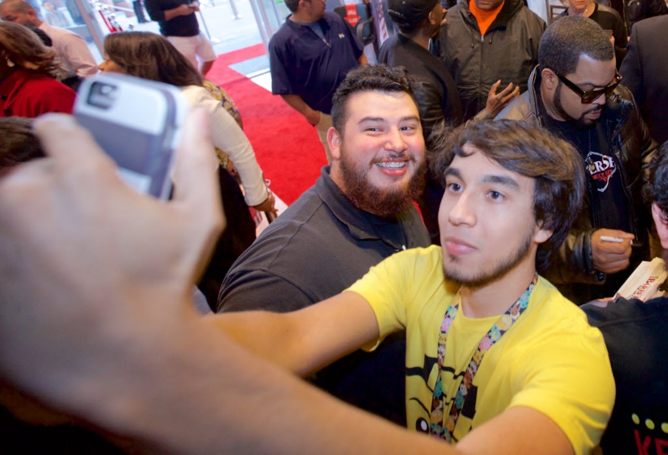 Irving Marroquin, right, and Daniel Rocha, left, pose for a selfie with O'Shea Jackson,...