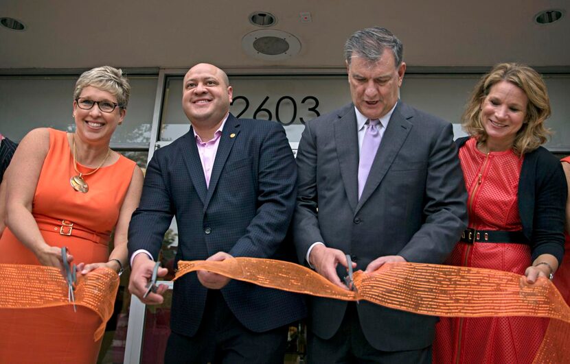 
The YWCA’s Jennifer Ware (from left) joined Adam Medrano, Mike Rawlings and council member...