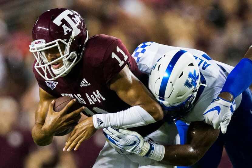 Texas A&M Aggies quarterback Kellen Mond (11) is sacked by Kentucky Wildcats linebacker Josh...