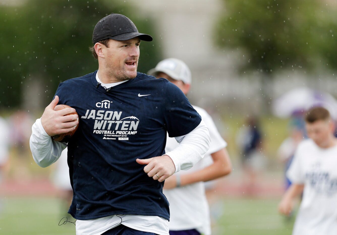 Former Dallas Cowboy tight end Jason Witten leads a passing drill station during the Citi...