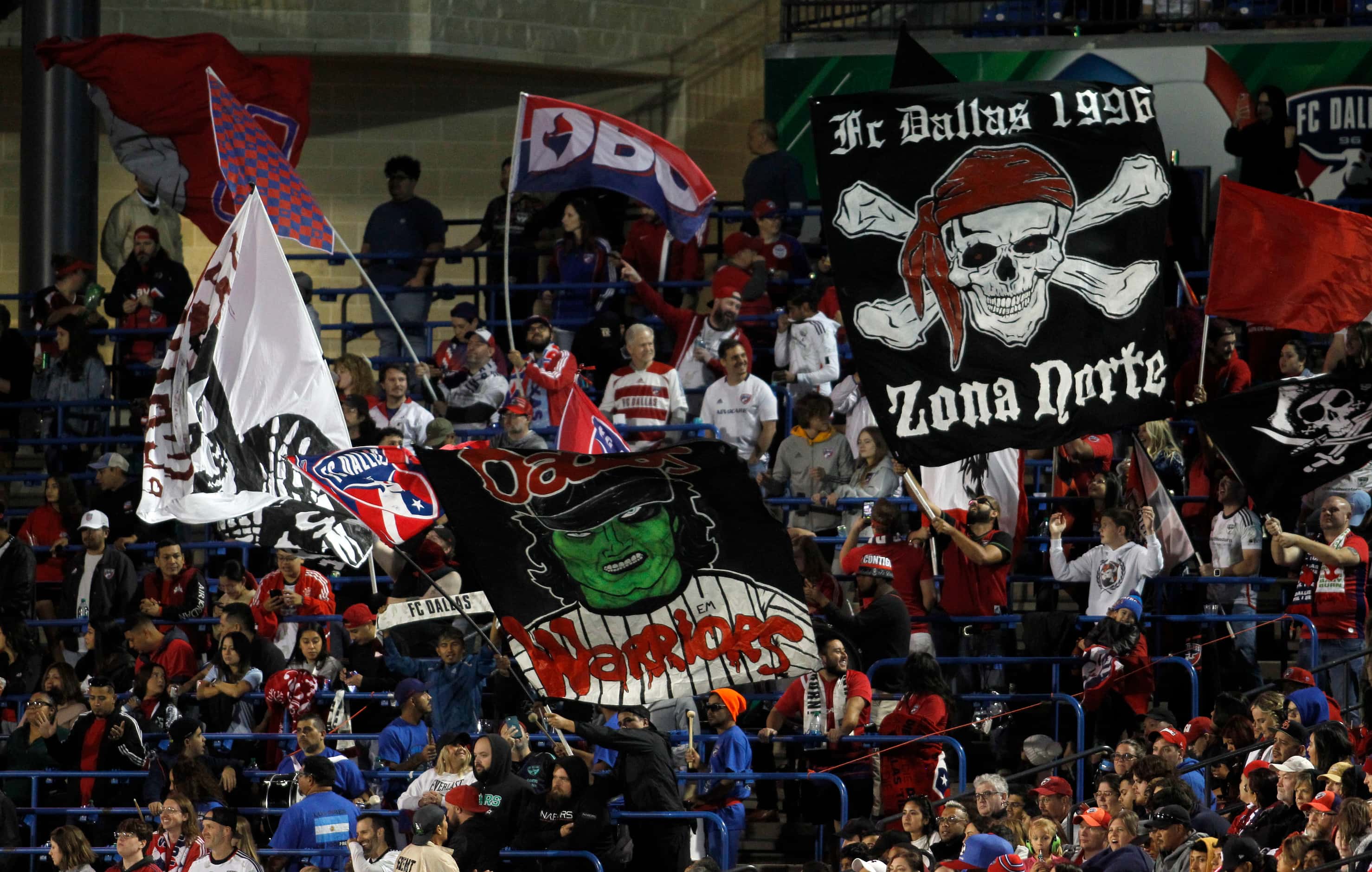 FC Dallas fans show their spirit during first half play against the Colorado Rapids. The two...