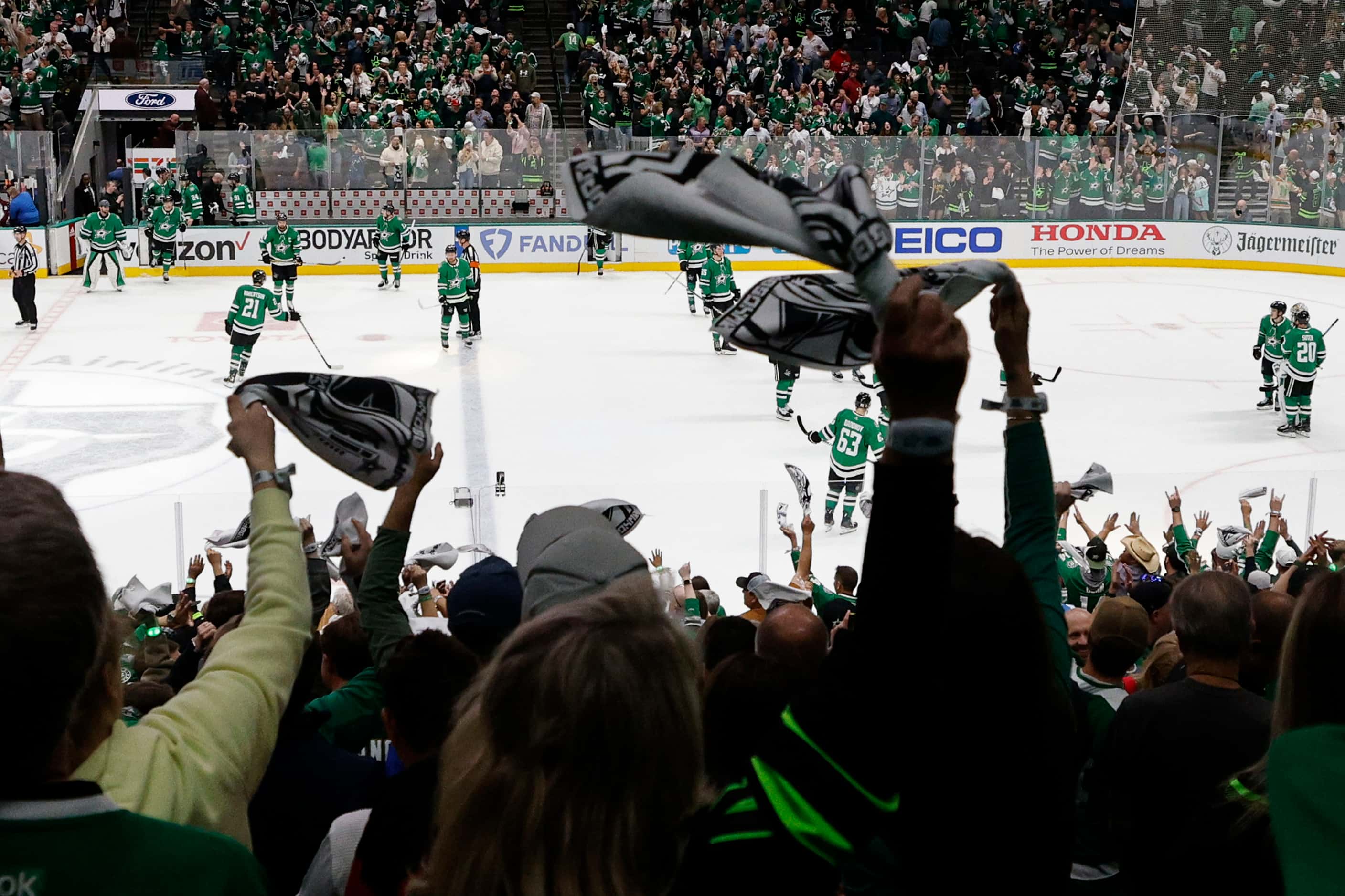 Dallas Stars fans wave towels during the third period in Game 2 of an NHL hockey Stanley Cup...