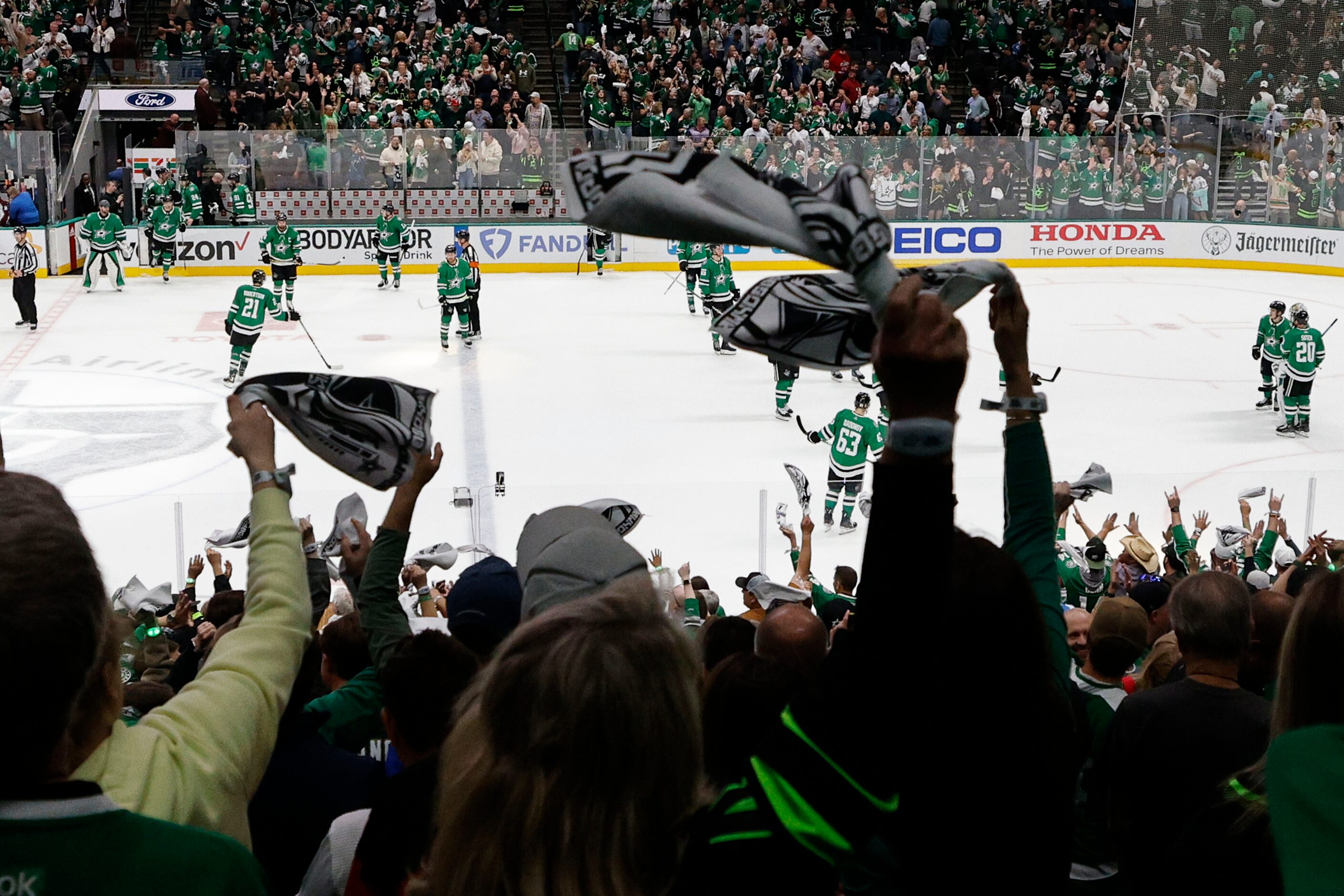 Dallas Stars fans wave towels during the third period in Game 2 of an NHL hockey Stanley Cup...