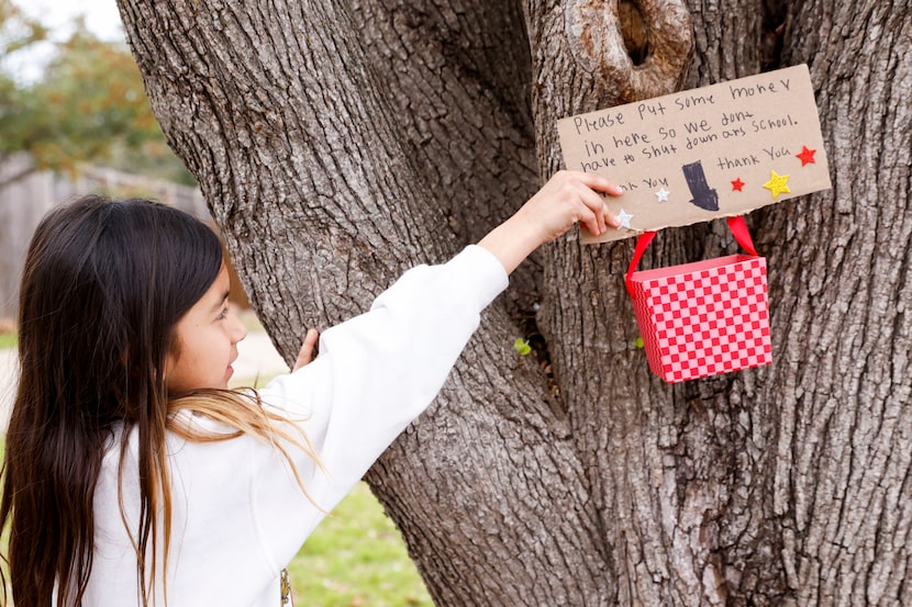 Greenwood Hills Elementary School third grader Coraline Gallegos, 8, shows where she thought...