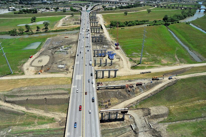 
Construction crews worked last year on the new eastbound Interstate 30 bridge over the...
