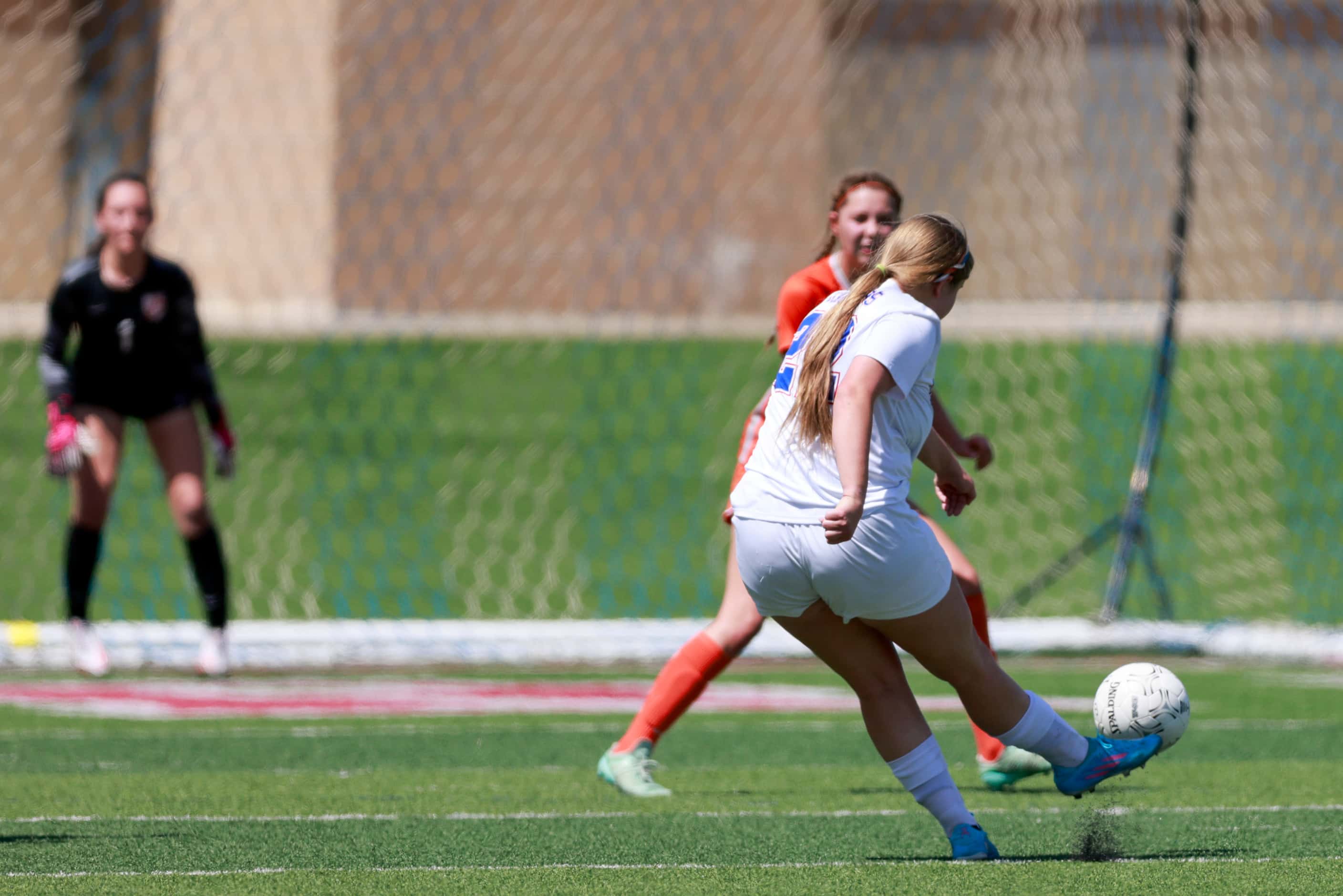 Midlothian Heritage midfielder Rose Giambruno-Fuge (22) scores a goal during the first half...