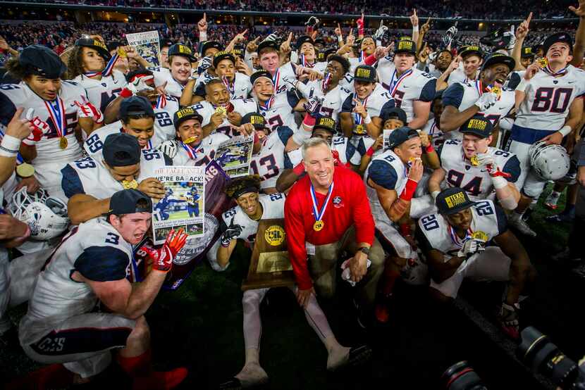 Allen head coach Terry Gambill head coach Terry Gambill gathers with his team for a group...