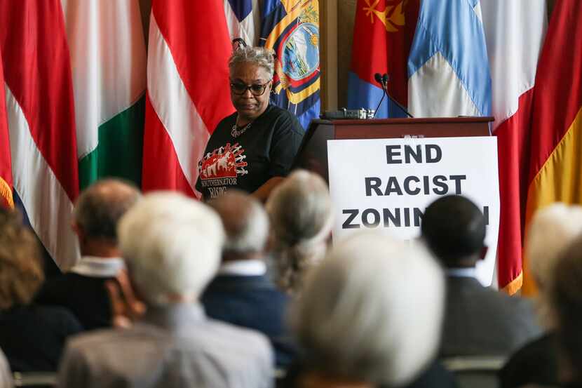 Marsha Jackson steps away from the podium after speaking during a press conference...