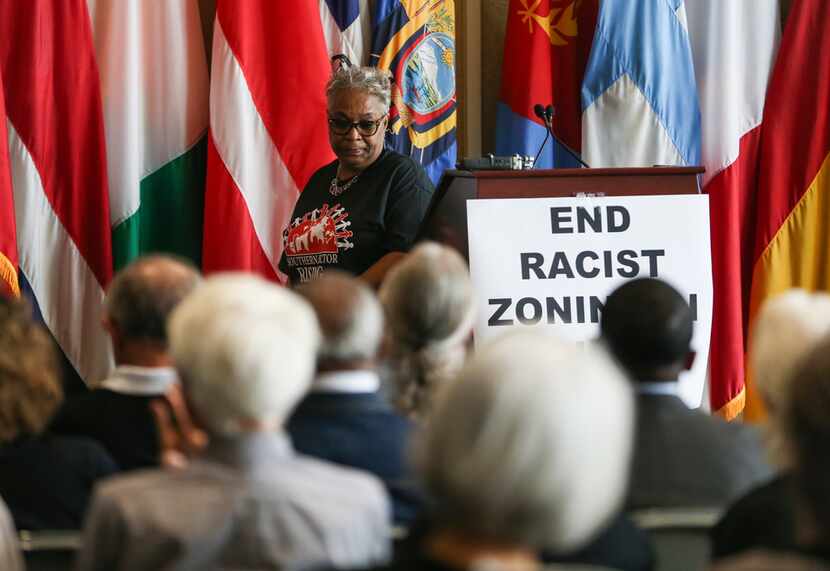 Marsha Jackson steps away from the podium after speaking during a press conference...