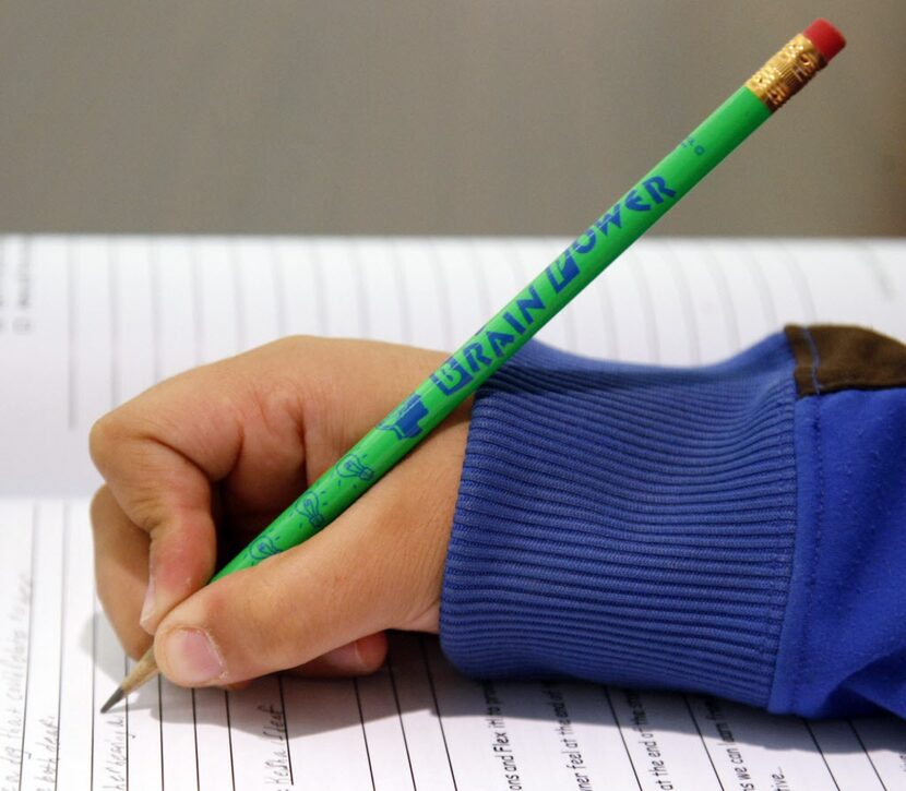  Joseph Ramos, 12, works in class at the Center for BrainHealth at University at Dallas...