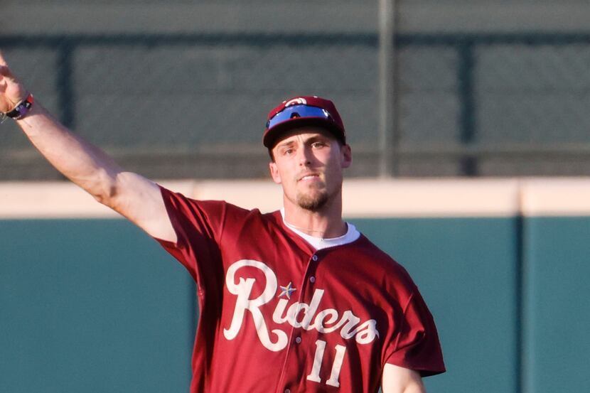 Frisco RoughRiders outfielder Evan Carter fields during the first inning of a baseball game...