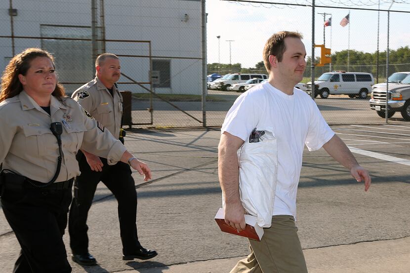 Former West paramedic Bryce Reed (right) was escorted from the McLennan County jail Thursday...