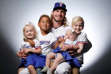 Texas Rangers Travis Jankowski pictured with children (from left) Radleigh, Jett, Wrenlyn...