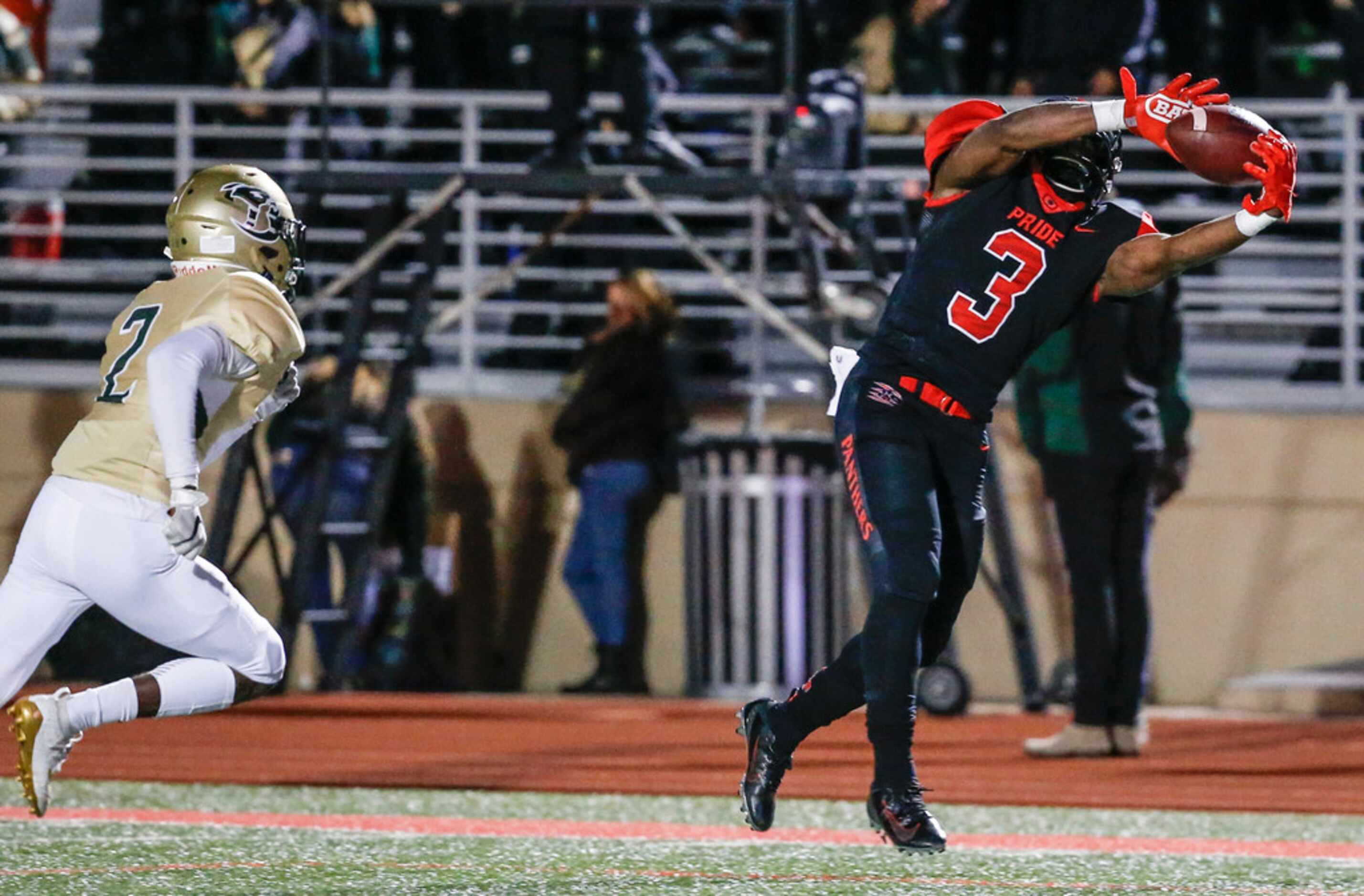 Colleyville Heritage wide receiver Isaac Shabay (3) receives a pass over Birdville defensive...
