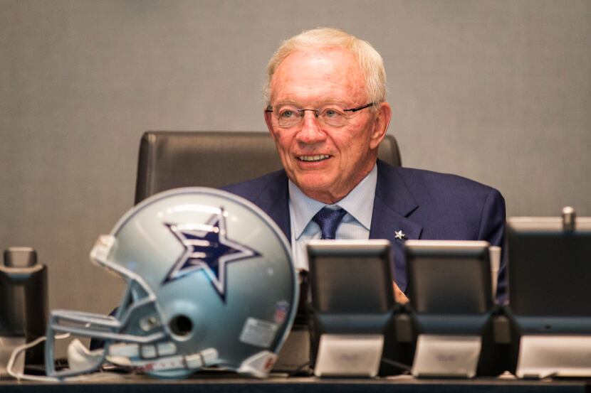 Dallas Cowboys owner Jerry Jones looks at the video board in the war room during round one...
