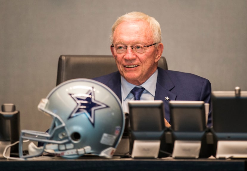 Dallas Cowboys owner Jerry Jones looks at the video board in the war room during round one...