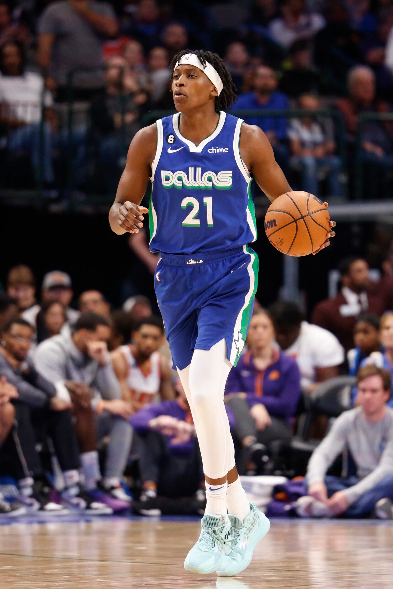 Dallas Mavericks guard Frank Ntilikina (21) dribbles up-court during the second half of an...