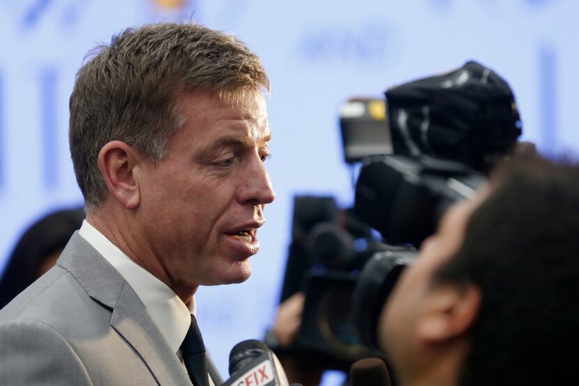 Troy Aikman talks with the media at a photo shoot for the Children's Cancer Fund Annual Gala...