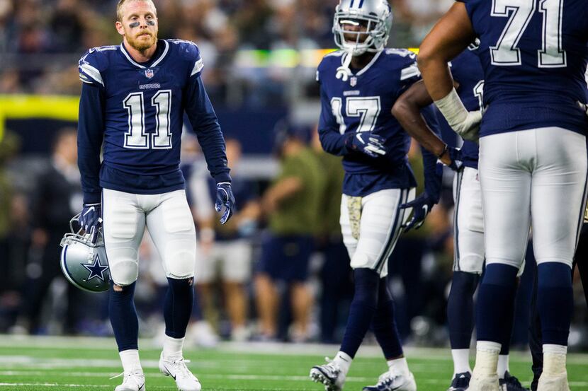 Dallas Cowboys wide receiver Cole Beasley (11) stands on the field during the fourth quarter...
