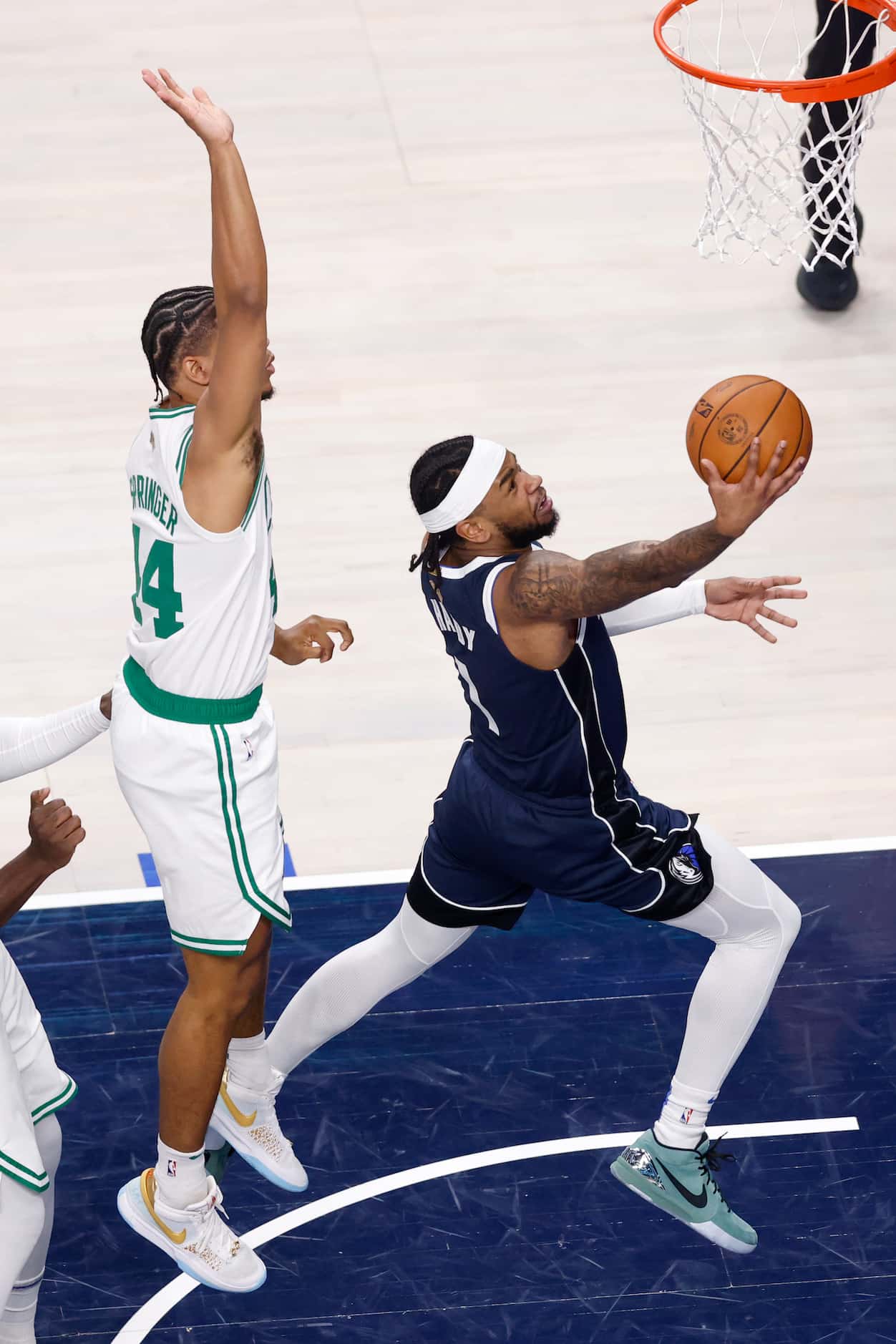 Dallas Mavericks guard Jaden Hardy (1) lays the ball up against Boston Celtics guard Jaden...