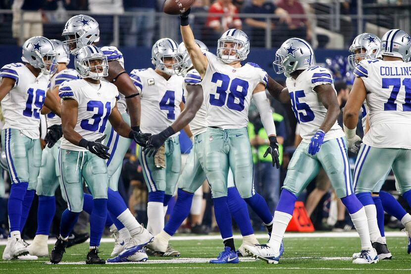 Dallas Cowboys strong safety Jeff Heath (38) celebrates after intercepting a pass by Kansas...