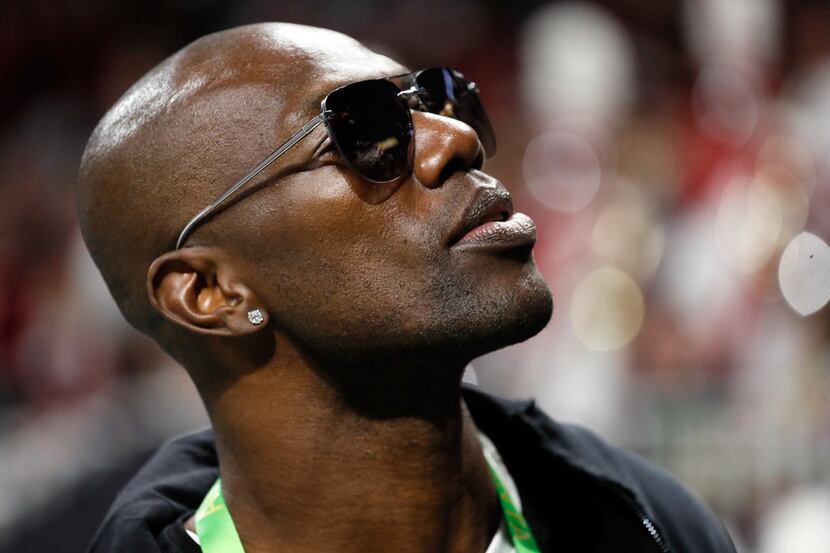 ATLANTA, GA - JANUARY 08: Former NFL player Terrell Owens looks on during the first half of...
