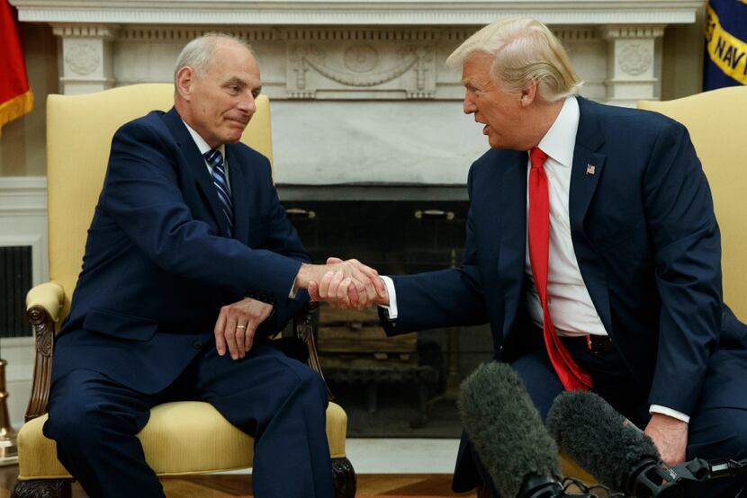 President Donald Trump talks with new White House Chief of Staff John Kelly after he was...