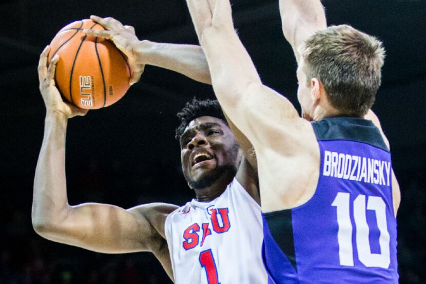 Southern Methodist Mustangs guard Shake Milton (1) goes up for a shot against TCU Horned...