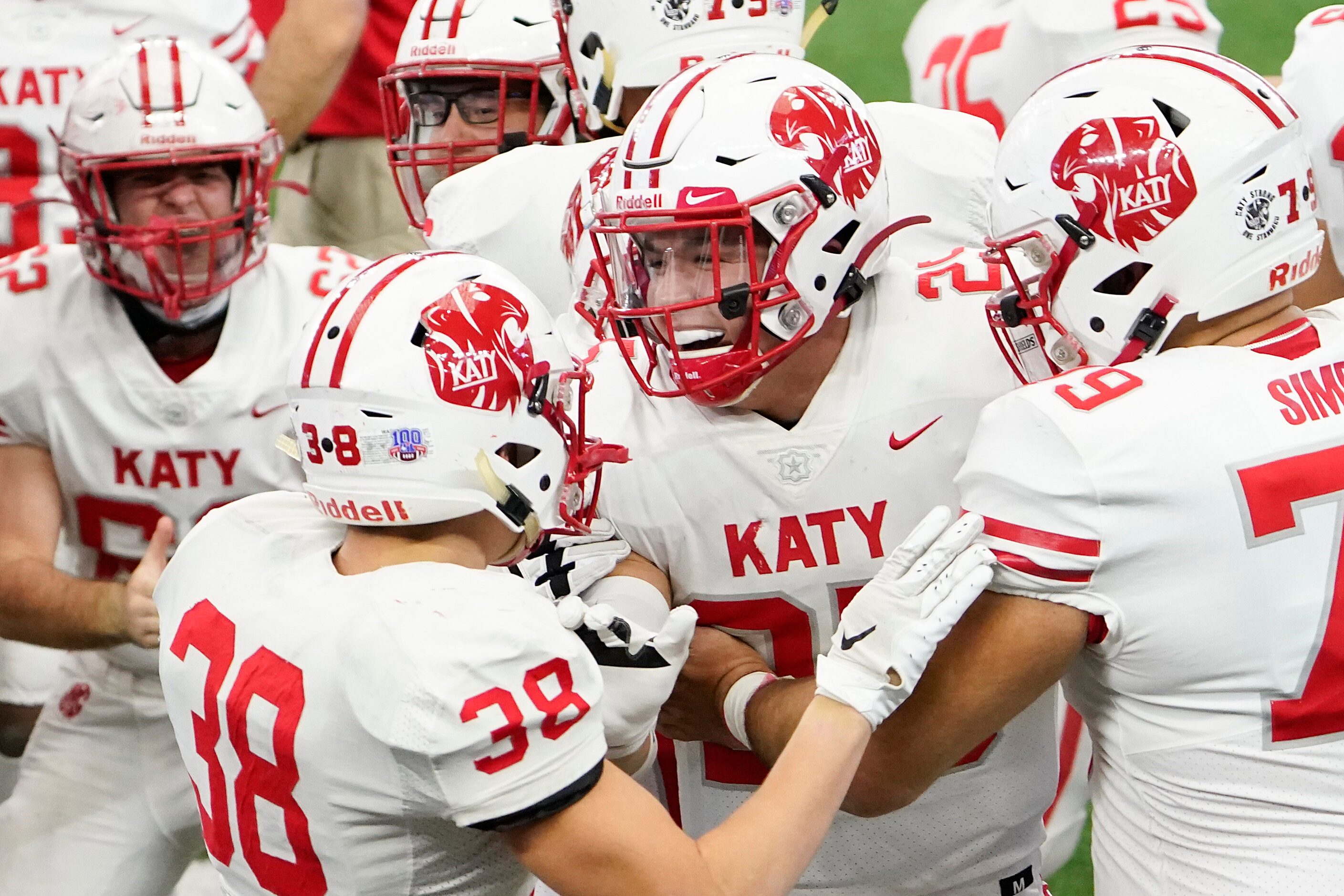 Katy linebacker Shepherd Bowling (25) celebrates with teammates after interceptin a pass...