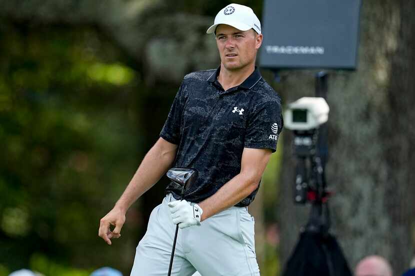 Jordan Spieth watches his ball from the third tee during the second round of the Tour...