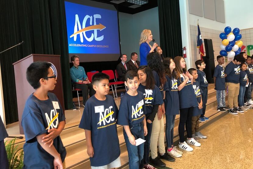 Richardson superintendent Jeannie Stone, with a group of students from Carolyn Bukhair...