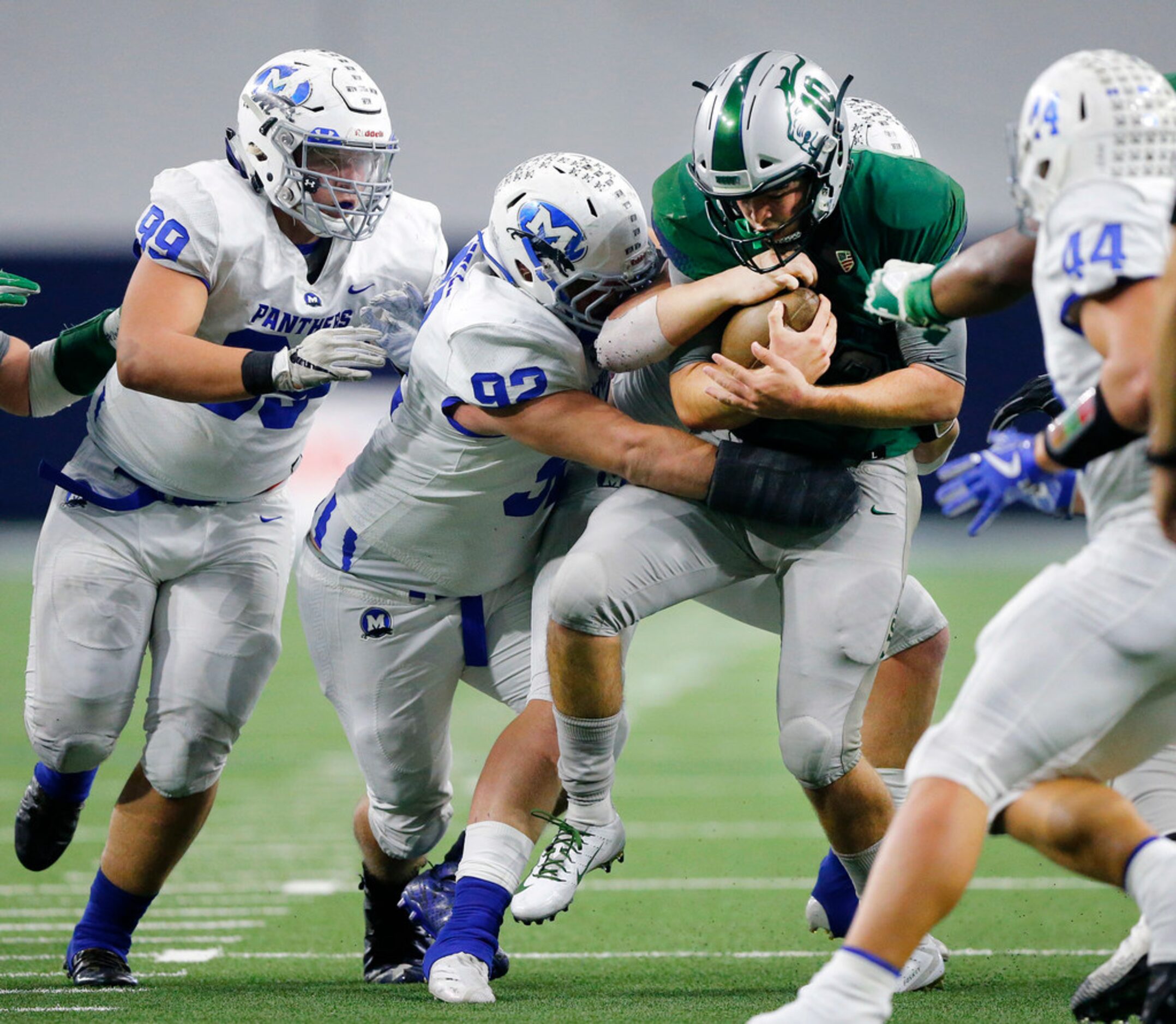 Frisco Reedy quarterback Josh Foskey (1) is wrapped up by Midlothian defensive lineman DJ...