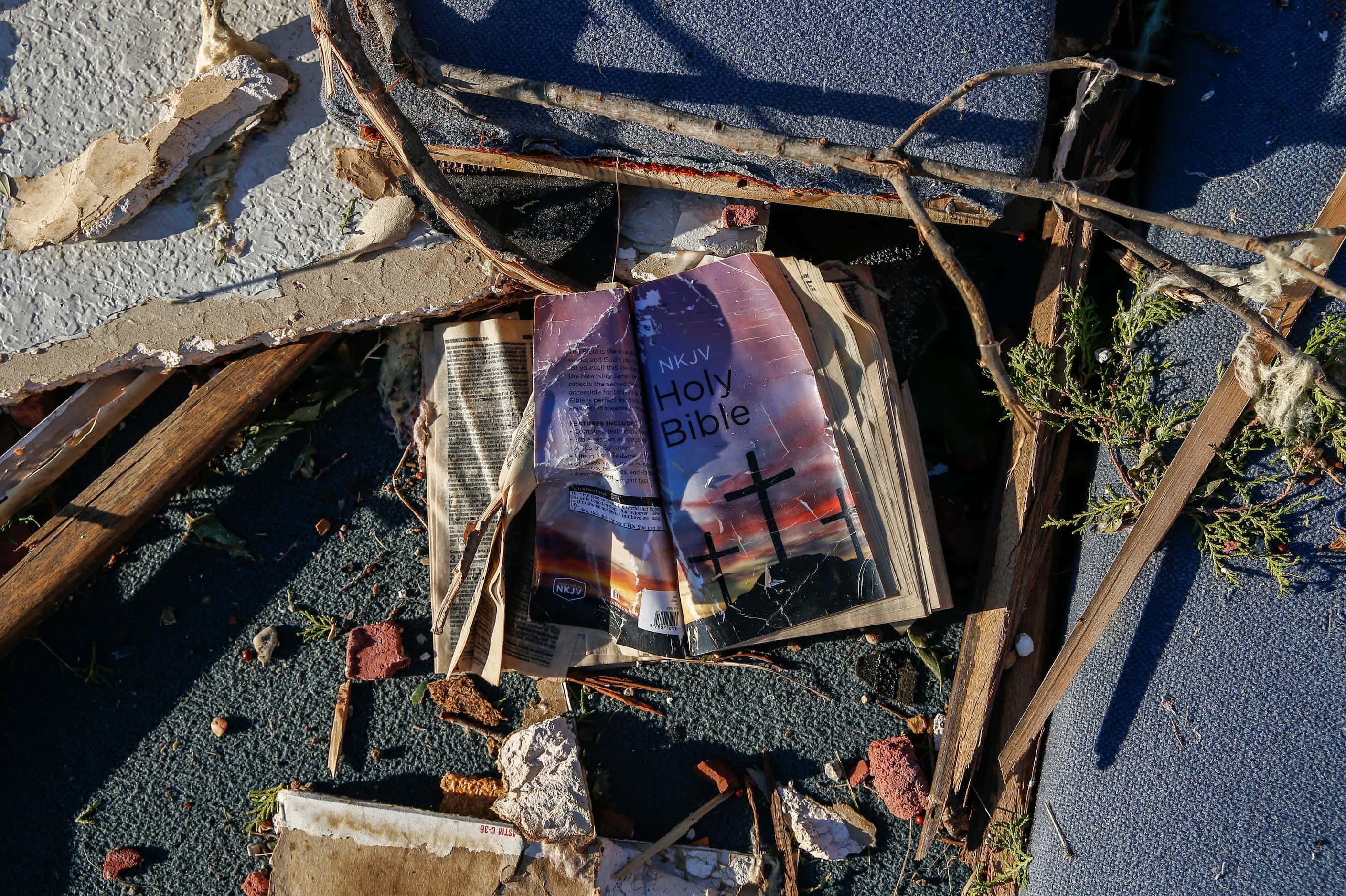 A bible is seen amongst the rubble at Primera Iglesia Bautista Mexicana church just off of...