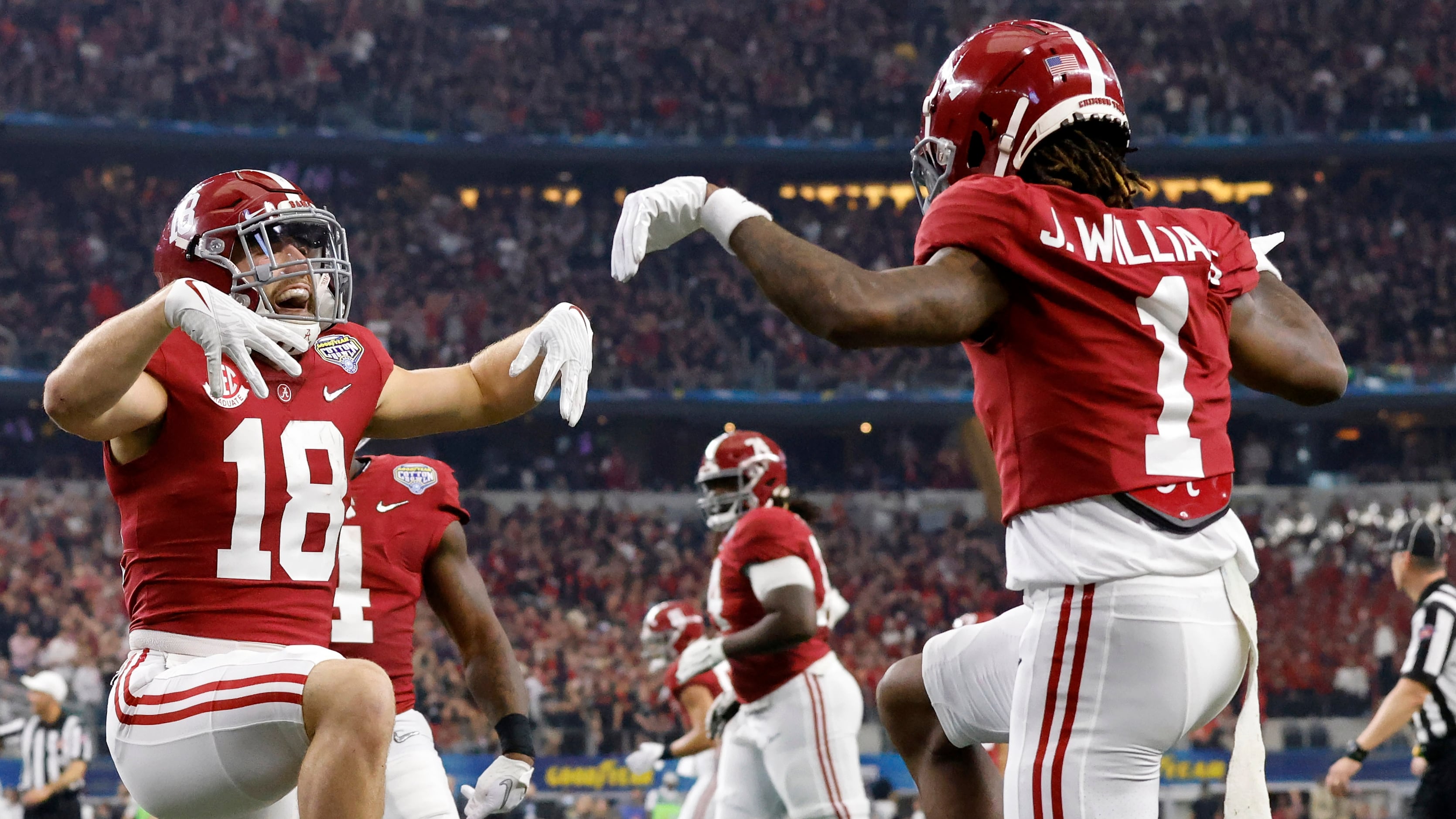 Former Razorback Treylon Burks surprises customers at Raising Cane's