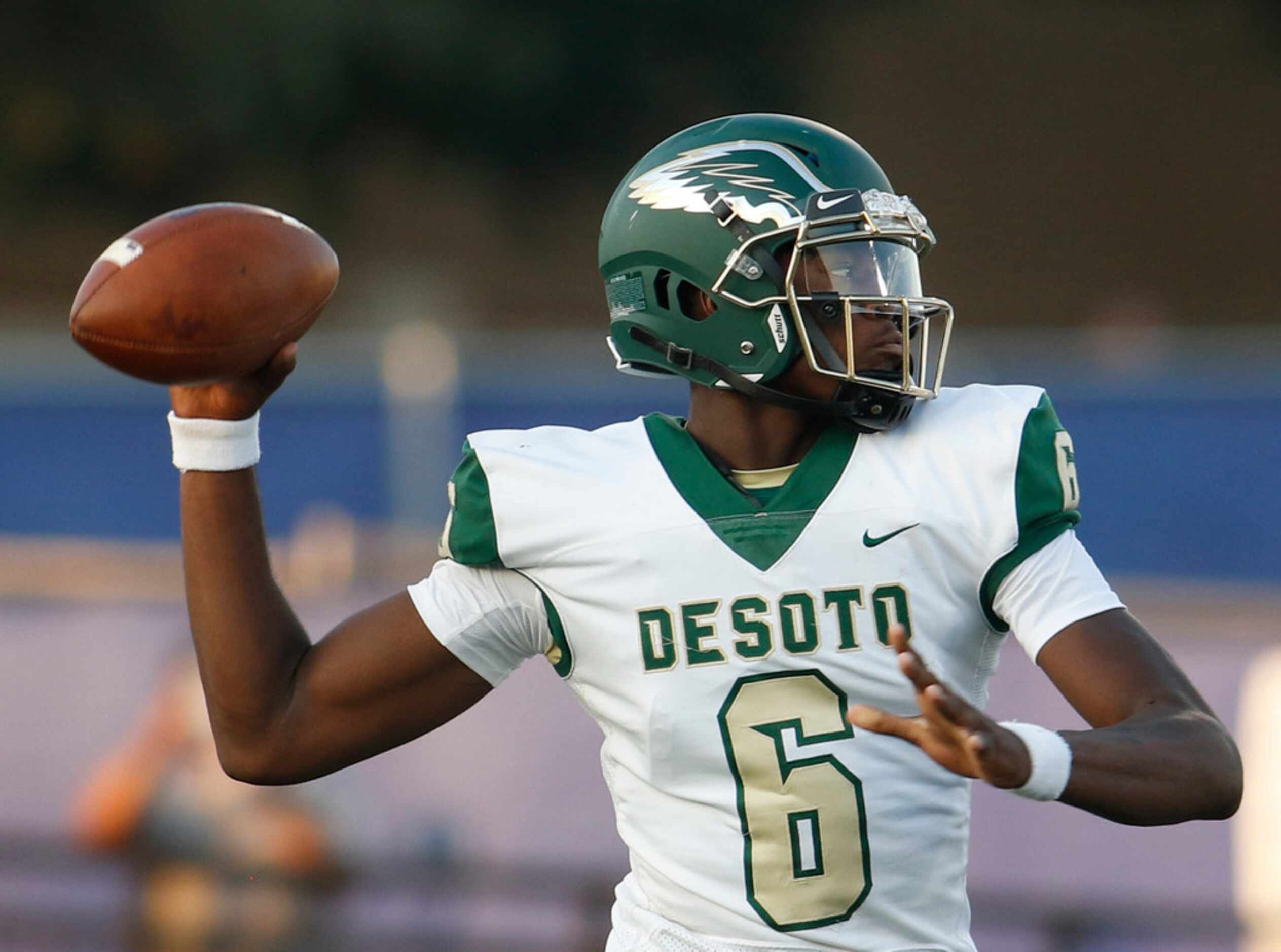 DeSoto quarterback Samari Collier (6) prepares to launch a pass during first half action...