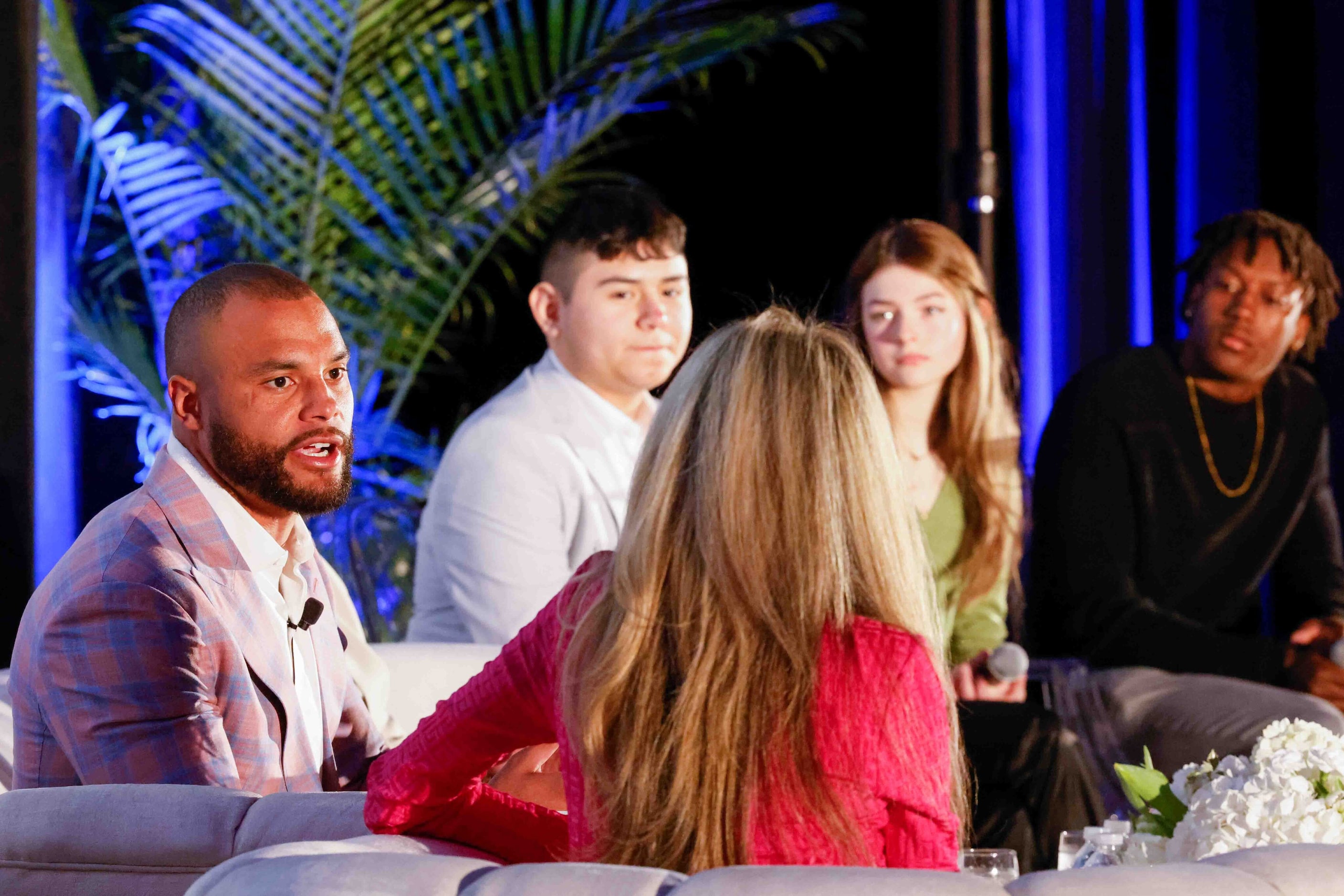 Dallas Cowboys Quarterback Dak Prescott (left) talks to moderator Andy Adler, sports anchor...