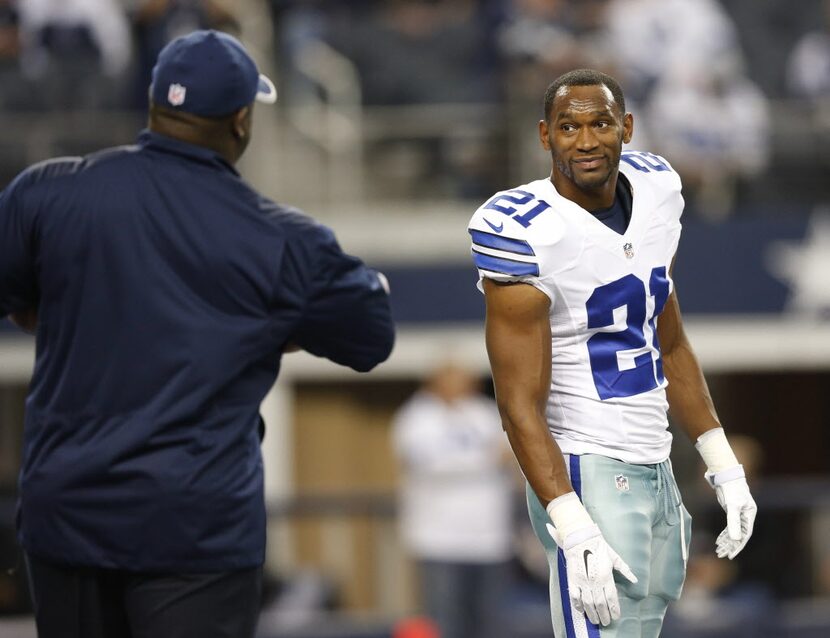 Dallas Cowboys running back Joseph Randle (21) and Dallas Cowboys running backs coach Gary...