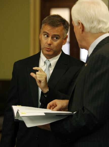 Reed O'Connor, shown here when he was the newest federal judge in North Texas, chats with U....
