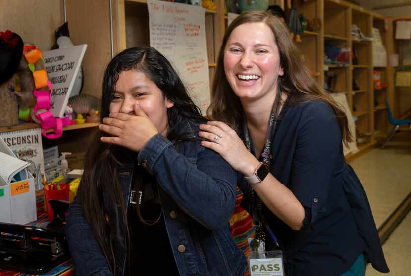 Freshman Silvia Rey (left) and ESL teacher Autumn Slosser share a laugh at Thomas Jefferson...