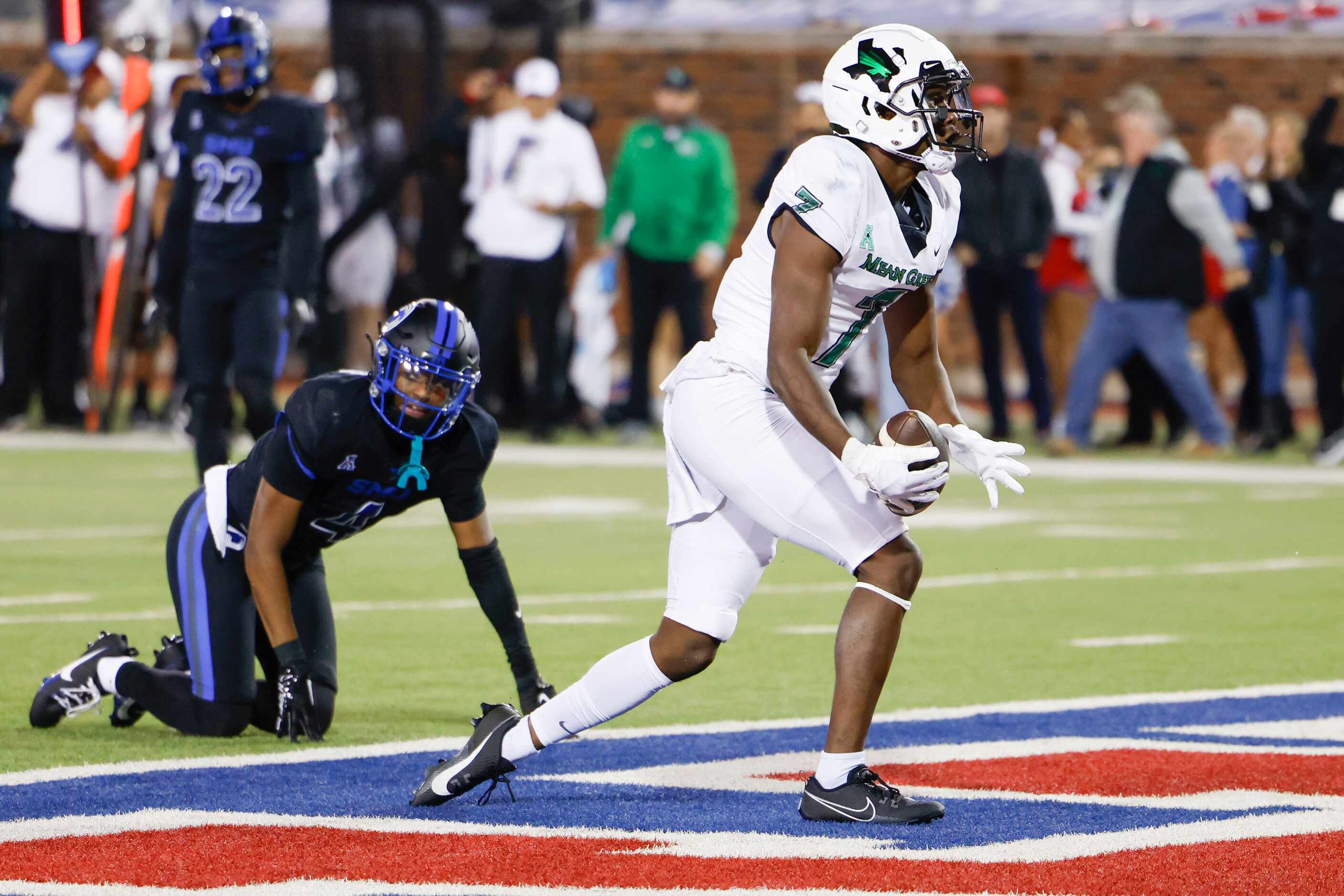 North Texas Mean Green wide receiver Trey Cleveland cheers after scoring a touchdown against...