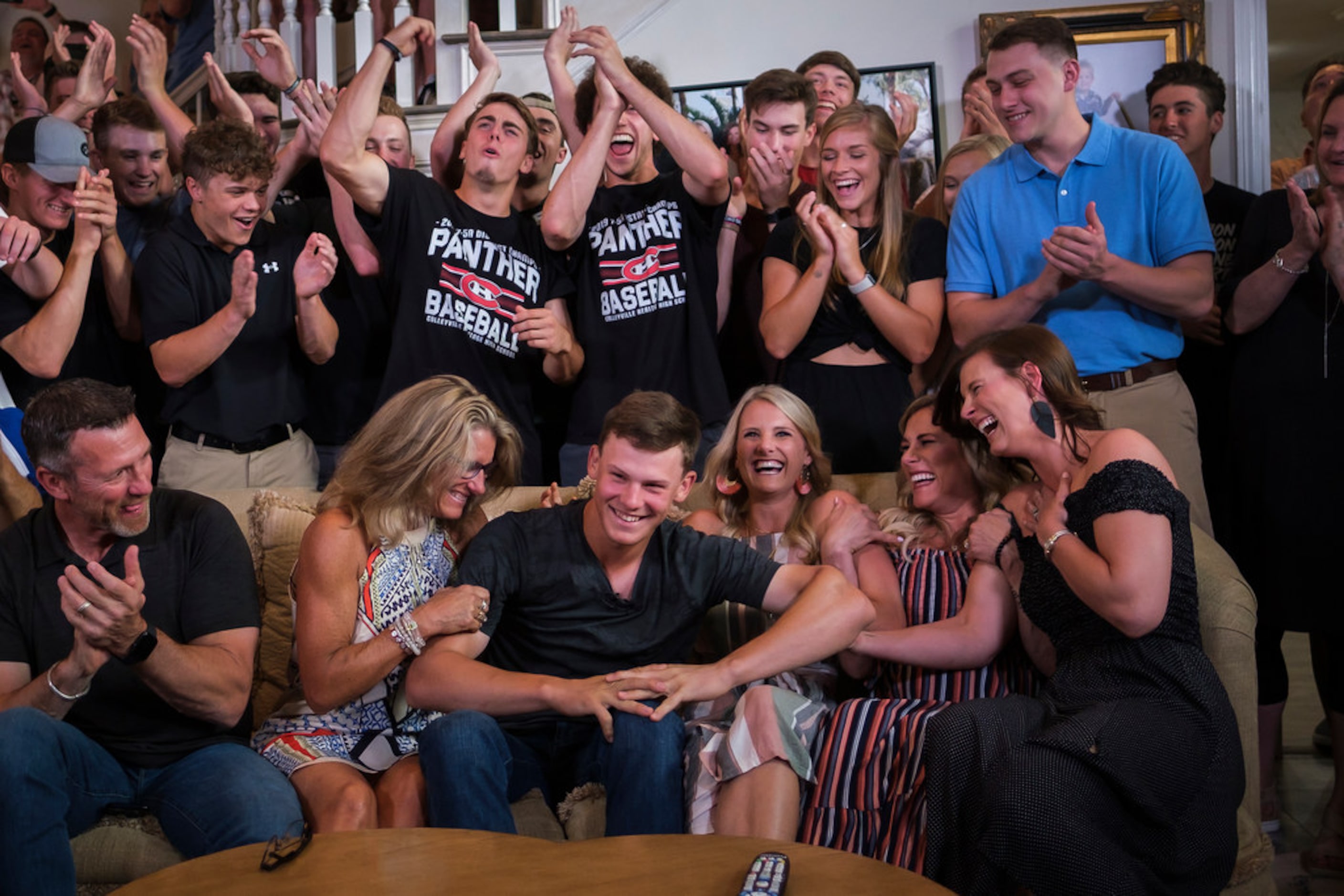 Bobby Witt Jr. (center) celebrates with (from left) his father Bobby Witt, mother Laurie...