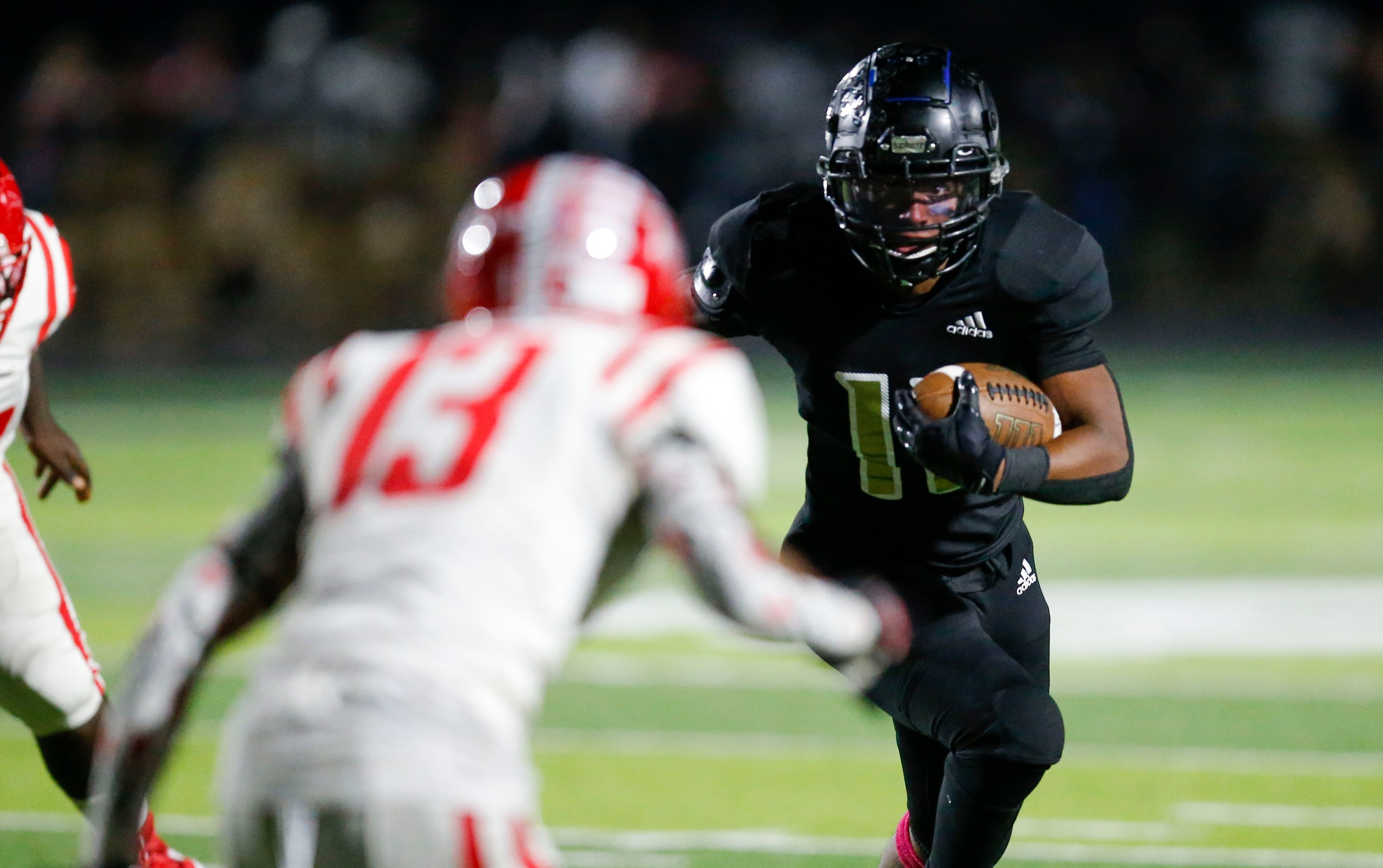 Kaufman junior running back Braxton Garmon (11) looks for room against Terrell junior Tray...