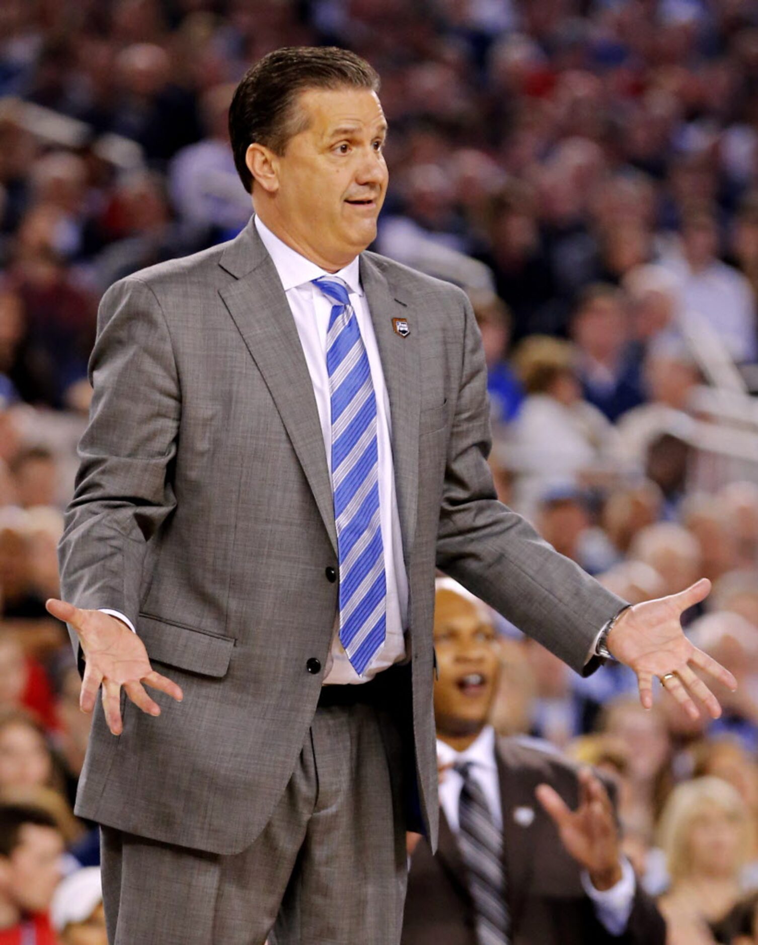 Kentucky Wildcats head coach John Calipari questions a call during the first half of their...