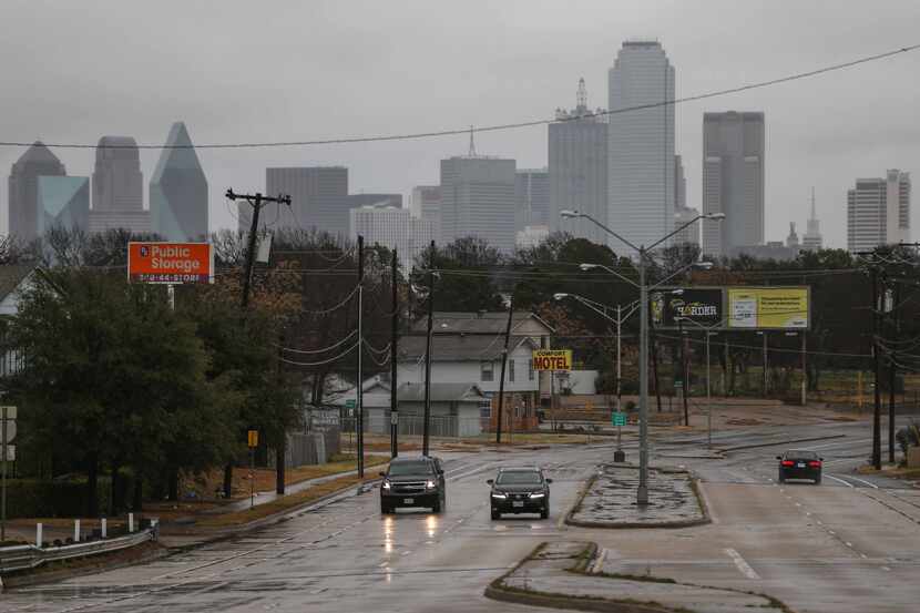 Traffic on Fort Worth Avenue and Vilbig Road on a rainy day in Dallas on Dec 30, 2020.