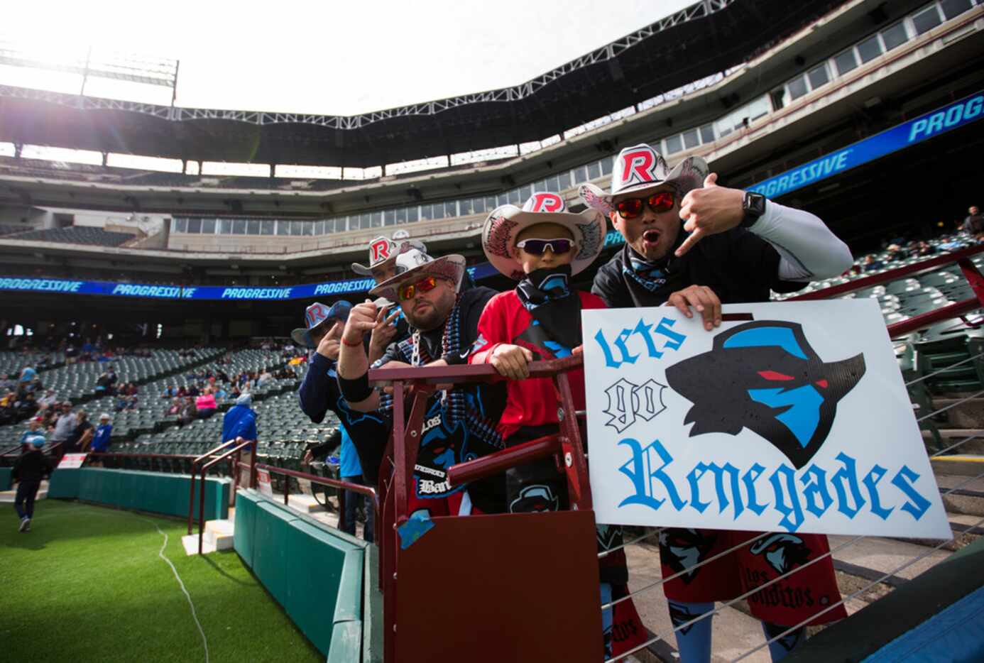 Dallas Renegades fans cheer as the team warms up before an XFL game between the Dallas...
